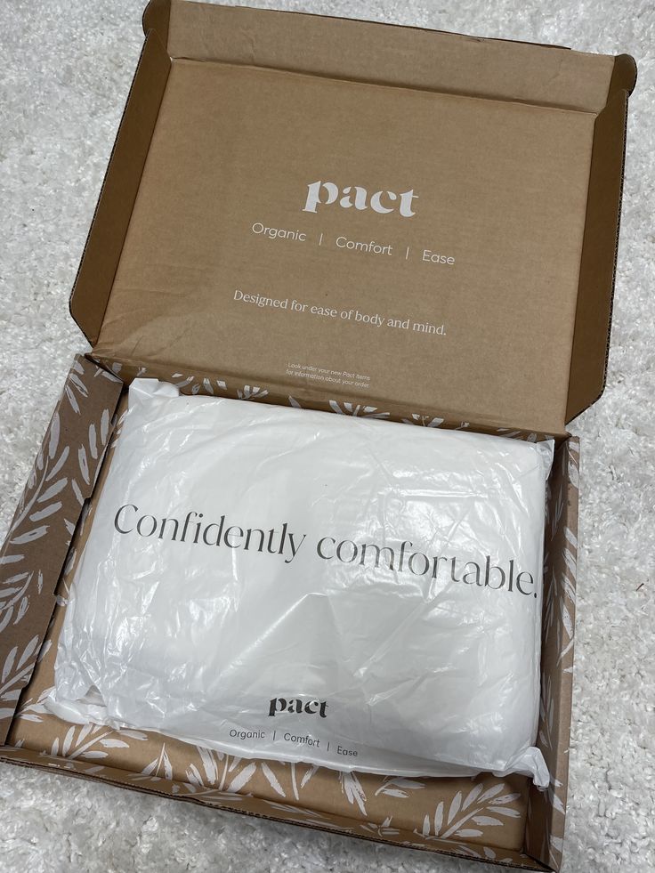 Pact uncoated kraft mailer box with botanical interior print and branded inner poly bag