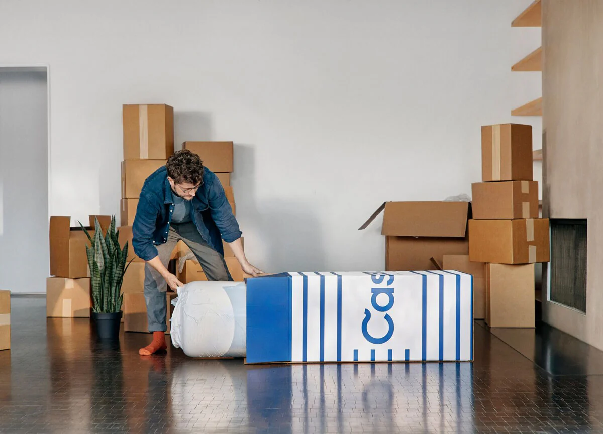 Casper bold blue and white striped double-wall corrugated shipper with bed-in-a-box mattress