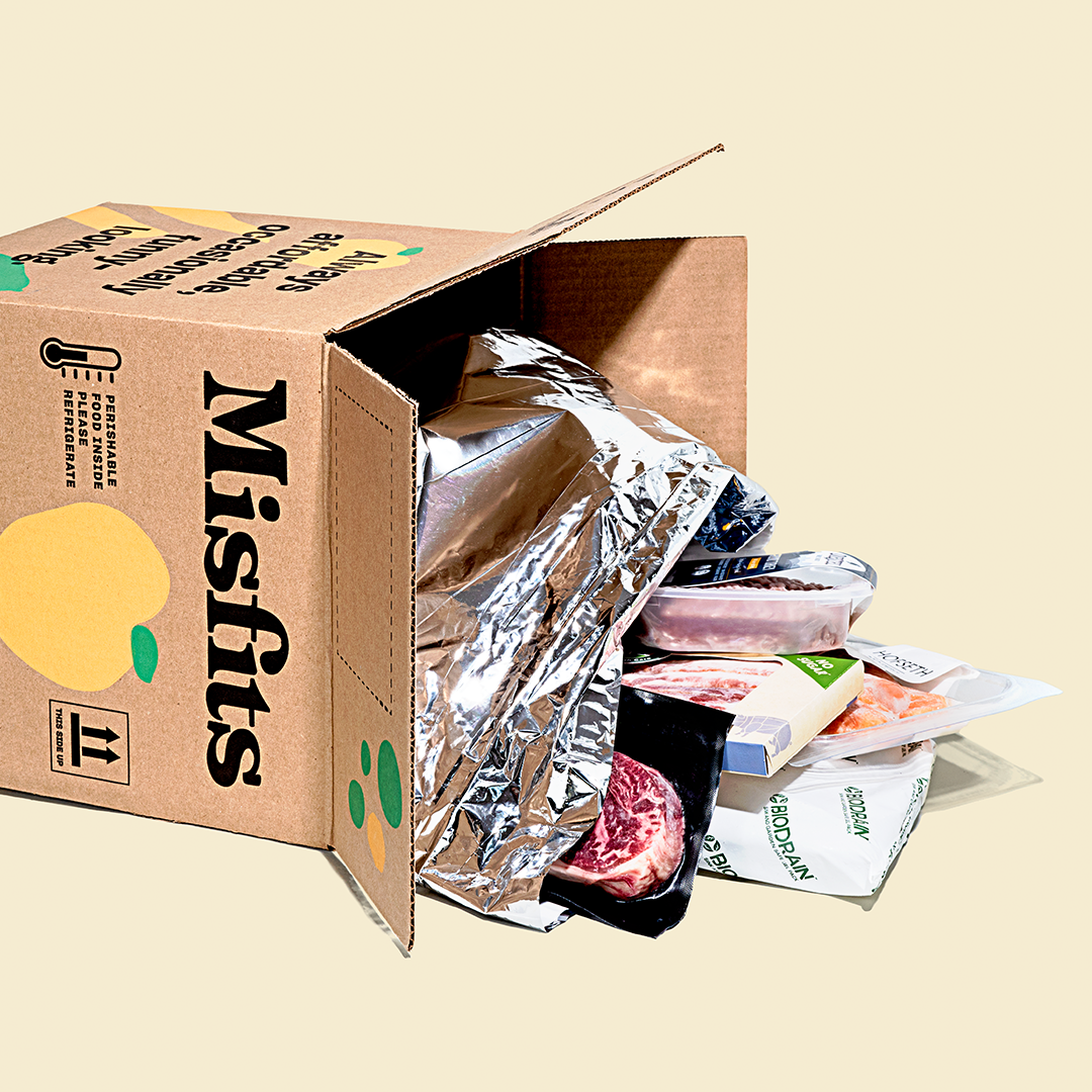 Misfits Market kraft corrugated box with illustrated custom print and insulated foil liner for perishable grocery delivery